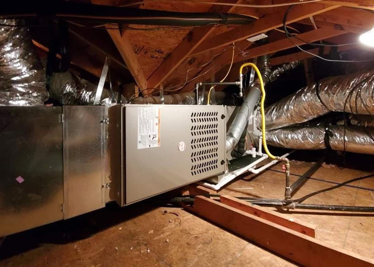 Bolton Heating and Air replacing a gas furnace at a home in Forney