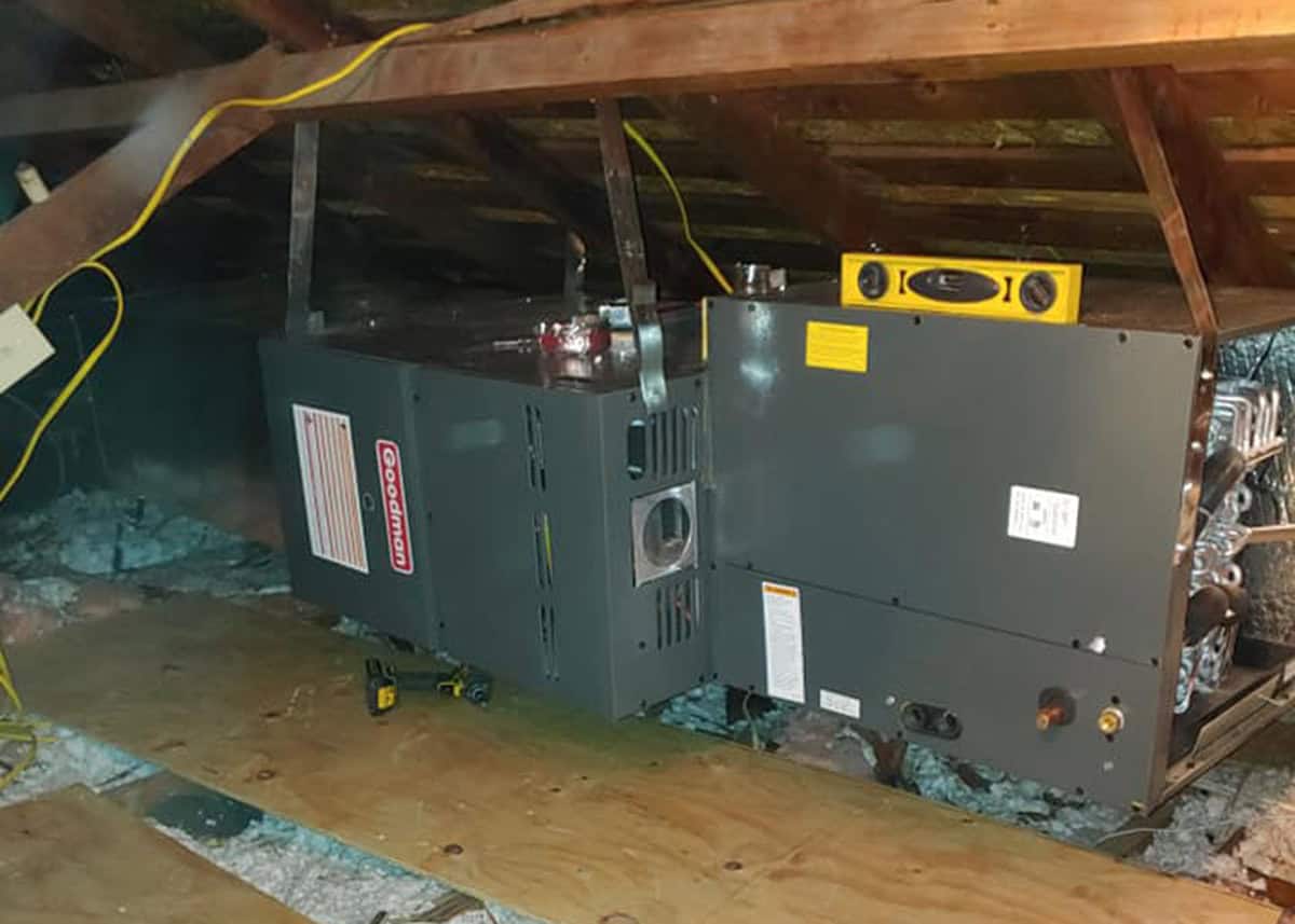 Bolton Heating and Air installing a gas furnace at a home in Forney