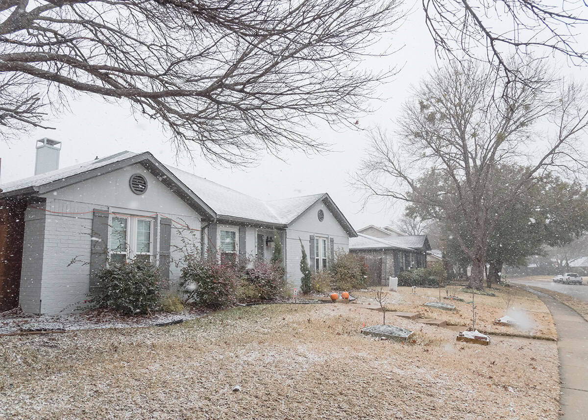 Snowy Falling Over A Residential Street In Forney, Texas